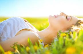 Lady lying in field